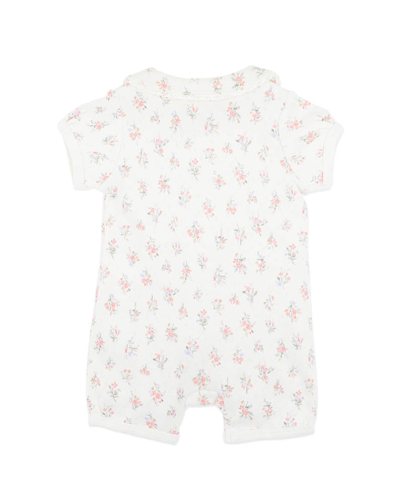 BEBE ORGANIC ANYA DISTY PRINT SHORT SLEEVE ROMPER