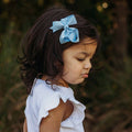 SNUGGLEHUNNY BABY BLUE BOW CLIP