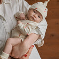 NATURE BABY COTTON KNOTTED BEANIE RASPBERRY PRINT